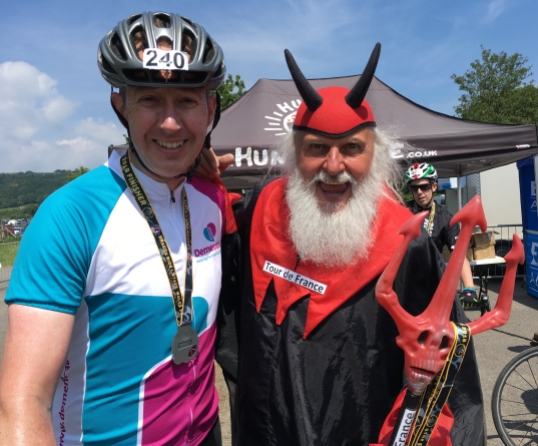 Celebrating the finish with Didi the Devil from the Tour de France
